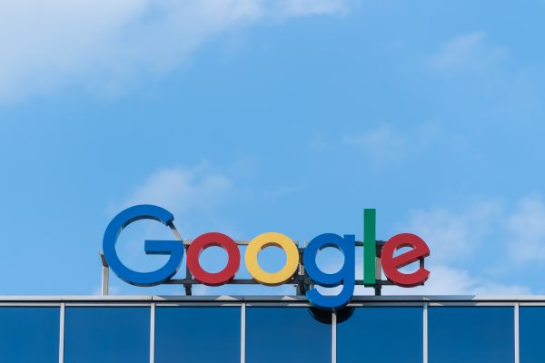 Google sign on top of a building.