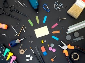 New teacher toolkit scattered on a black table